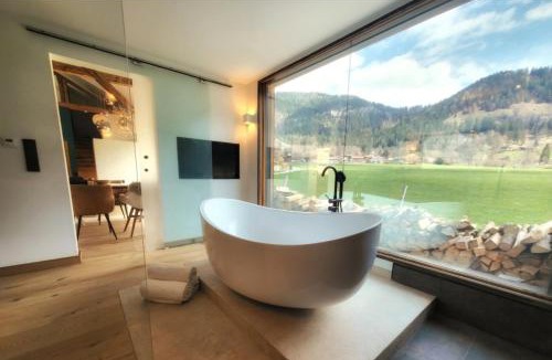 Bayrischzell Ski Chalet | stylische Alpenlounge mit Pool, Blockhaus-Sauna und Jacuzzi für bis zu 12 Personen
