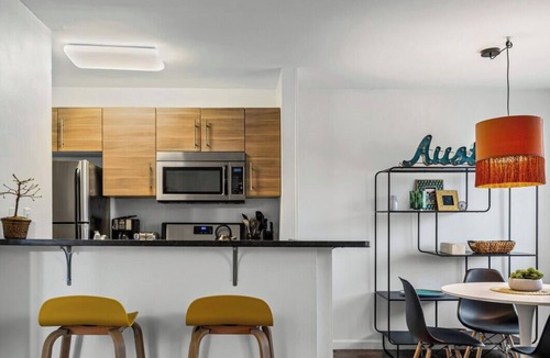 Travis Heights Condo | Stylish 1BR/1BA SoCo Condo | Skyline Views, Pool & Parking by Austin Vacay