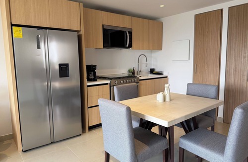 Del Carmen Apartment | Stylish 2BR/2BA apartment in Vivant Mitikah with luxury finishes and top amenities: pool, gym, business center & more. Located inside Mitikah Mall with shops, restaurants, and Walmart downstairs—everything you need in one place. 24/7 security.