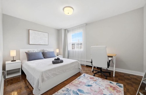 Parkdale House | Stylish 2BR condo with 2 Balconies & Workspace
