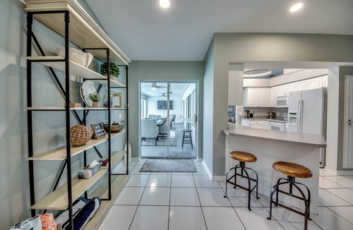 Caloosahatchee Villa | Stylish 4 BR/2 bath waterfront Villa with heated pool/bicycles