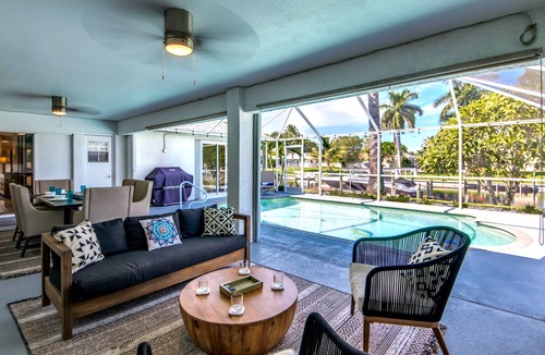 Caloosahatchee Villa | Stylish 4 BR/2 bath waterfront Villa with heated pool/bicycles