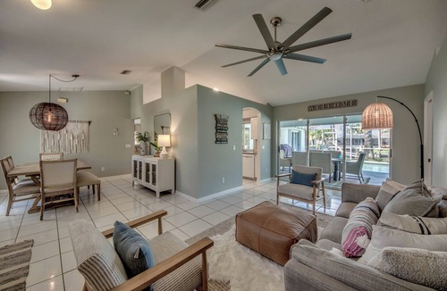 Caloosahatchee Villa | Stylish 4 BR/2 bath waterfront Villa with heated pool/bicycles