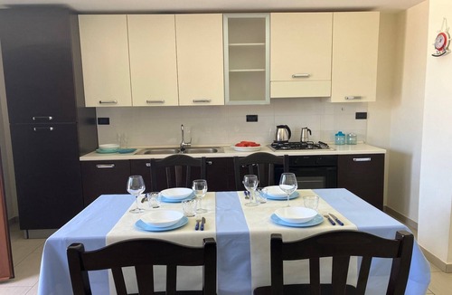 Santa Maria del Focallo Apartment | Stylish Apartment by the Sea