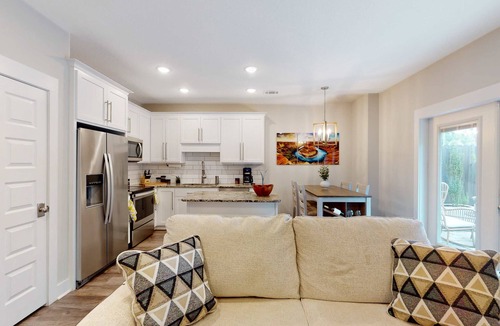 Downtown Condo | Stylish, dog-friendly townhome with firepit & enclosed yard - blocks to downtown