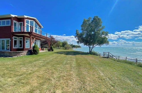 Charlevoix House | Stylish Home with Private Beach Views, Hot tub