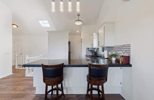 Prairie Creek Condo | Stylish Lake View Retreat with Balcony