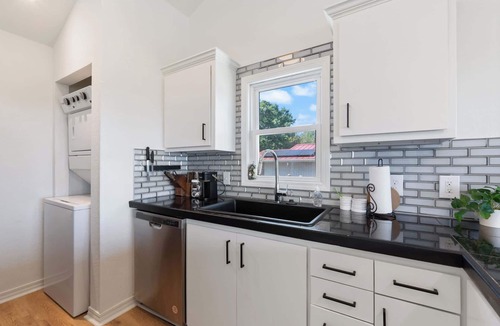 Prairie Creek Condo | Stylish Lake View Retreat with Balcony