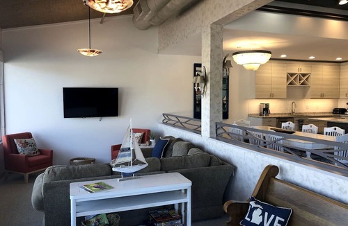 Macatawa House | Stylish Lakefront Loft with Marina Views at Eldean Shipyard near Macatawa, Michigan