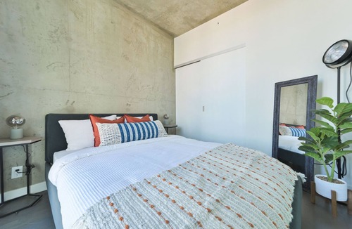 Connaught Condo | Stylish Modern w/ Heated Parking & Views of Skyline | Mins to Saddledome