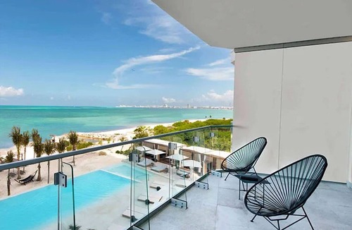 Downtown Cancun Hotel | Stylish Ocean Front Suite w/Balcony | 2 Family Ready Rooms | Outdoor Pool