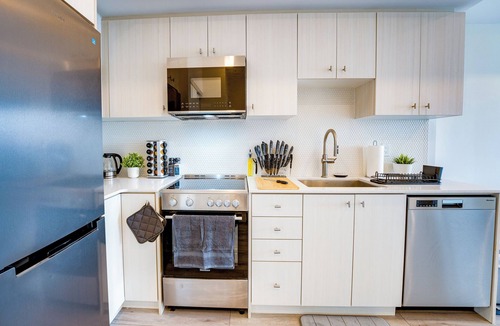Kitchener Apartment | Stylish Open Concept Condo w/Gym