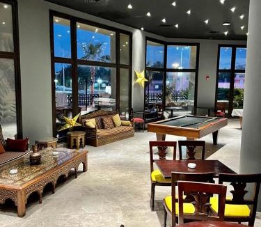 Village Road Apartment | Stylish pool view Studio in Al Dau Height’s