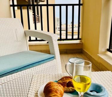 Village Road Apartment | Stylish pool view Studio in Al Dau Height’s