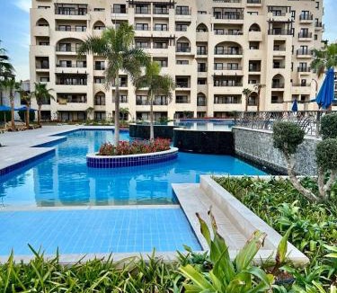 Village Road Apartment | Stylish pool view Studio in Al Dau Height’s