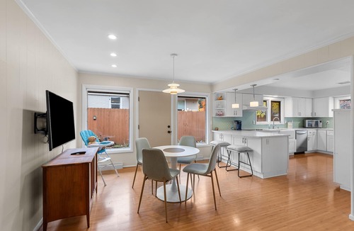 Moran Prairie House | Stylish South Hill Getaway | Bar & Game Room