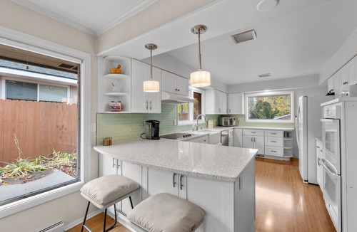 Moran Prairie House | Stylish South Hill Getaway | Bar & Game Room