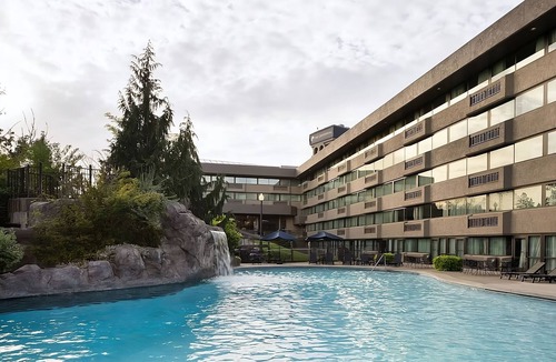 Riverside Hotel | Stylish & Spacious Suite! Centrally Located | Seasonal Outdoor Pool Onsite