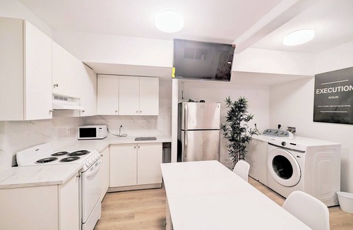 Queens Apartment | Stylish Studio Apartment on Main Street with Courtyard and Free Parking!