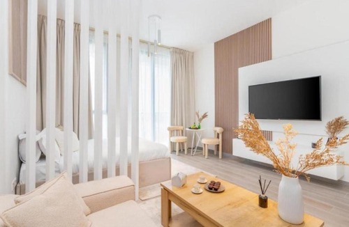 Dubai Production City Apartment | Stylish Studio Midtown 20 mins to Expo City by Vibel