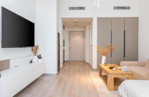 Dubai Production City Apartment | Stylish Studio Midtown 20 mins to Expo City by Vibel