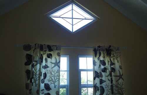 Bottom Bay Apartment | Stylish villa apt, world famous Bottom Bay 5 min walk,swimming pool.A/C
