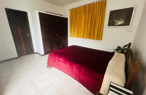 Enseada House | Suíte suspensa Guarujá