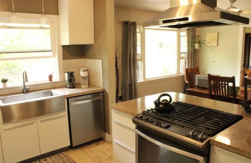 Walker House | Suburban Garden on 1.5 acres with pool and hot tub