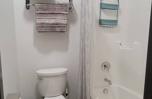 Pacific Hotel | Suite with kitchen near Six Flags and the St. Louis area in The Landing Hub Hotel with onsite activities