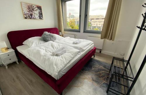 Rathaus Apartment | Suite4Monteure - Modern & Zentral in der City I Küche I Waschmaschine I Balkon