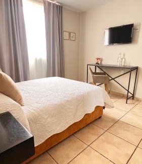 Leon House | Suites ciento 37