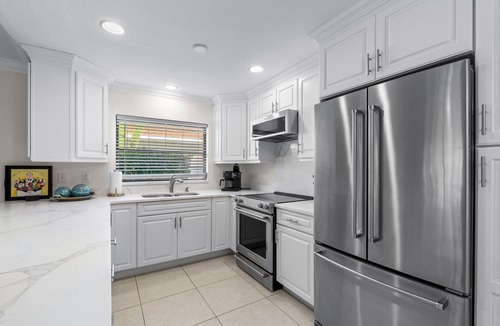 Naples Park House | Summer Specials! Amazing Pool Oasis, Close to the Beach, FREE Bikes, Amenities
