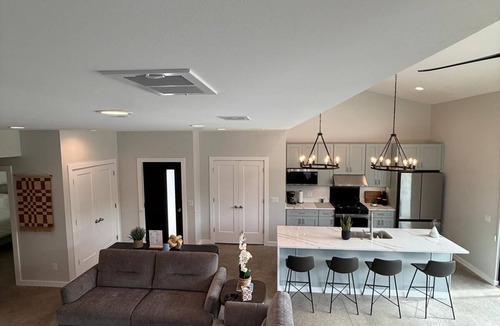 Stevensville House | Summer specials.luxury home with heated Pool, Hot Tub, near beaches, sleeps 15