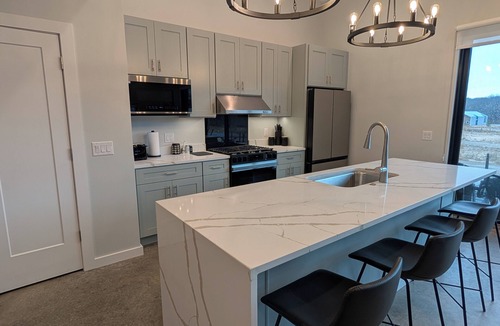 Stevensville House | Summer specials.luxury home with heated Pool, Hot Tub, near beaches, sleeps 15