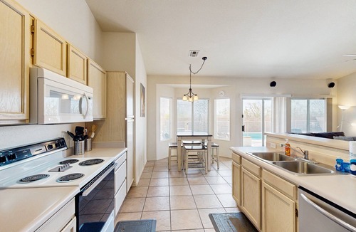 Casas Adobes House | Sun-filled dog-friendly home with private pool, putting green, & mountain views