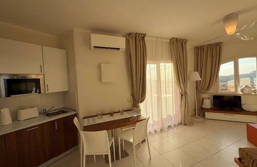 Canneddi Apartment | Sunset Costa Rossa 1221 - Enchanting sunset sea view Cala Rossa Sardinia