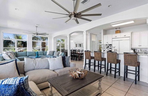Holiday Isle House | Sun Kissed Home with Boat Dock, Pool & Tiki Cruise