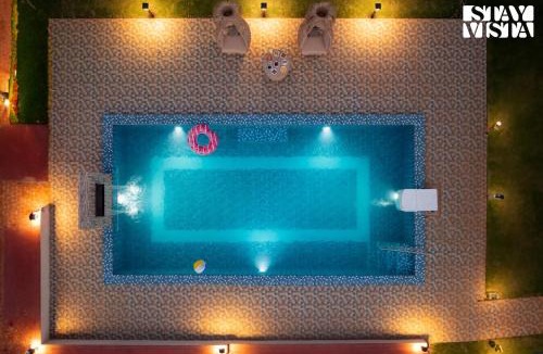 Alibaug Villa | Sun N Sky by StayVista - Poolside villa with chic interiors, lawn & gazebo
