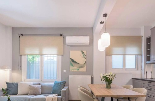 Koukaki Apartment | Sun-Splashed Sanctum w/Green Patio, Acropolis