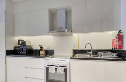 Dubai Apartment | Sunlit Studio At Golf Promenade 2A DAMAC Hills by Deluxe Holiday Homes