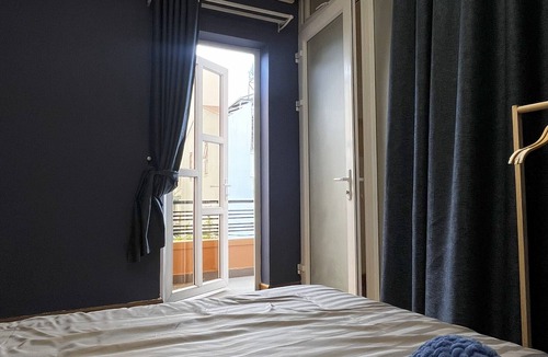Phuong 10 Hotel | Sunny doubled-balcony hotel suites in the spacious and cozy villa
