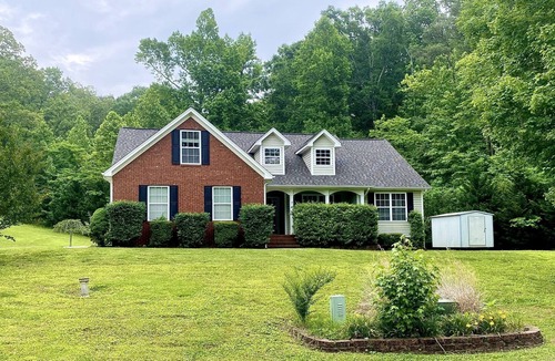 Flintstone House | Sunny Flintstone Haven with large deck, pool, hot tub, and game room!