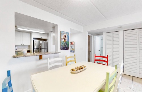 St. Augustine Beach Condo | Sunny ground-floor condo w/private patio, W/D, on-site pools, tennis court, BBQ