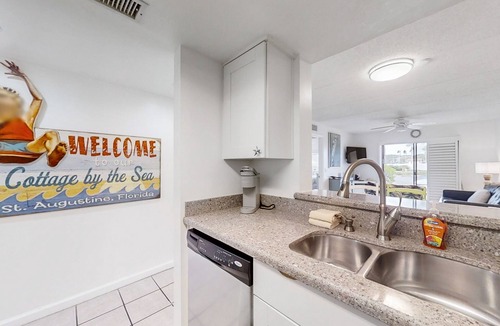 St. Augustine Beach Condo | Sunny ground-floor condo w/private patio, W/D, on-site pools, tennis court, BBQ