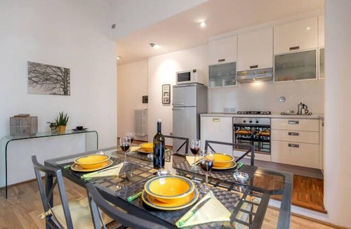Le Cure Apartment | Sunny Open Space with Terrace close to EUI with free street parking nearby!