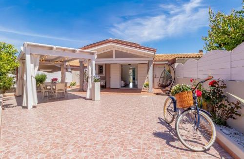 Valledoria Villa | SUNSET BAY POOL VILLA SARDINIA with private heated pool, jacuzzi, counter-current swimming