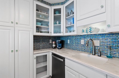 Villa Sabine Condo | Sunset Bay Views! 3 bed, 2 bath End Unit Condo with Pool, Dock and Water Access