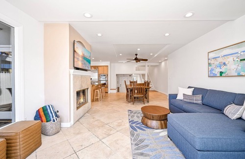 Sunset Beach House | Sunset Island Waterfront Home with Kayaks across the Street from the Beach