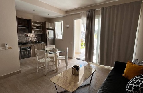 Dominicus Apartment | Sunset Paradise Tracadero Apartment: Sea pools access Private Garden WorkSpace