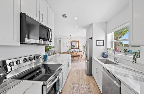 Juno Beach House | Sunset Ridge Cottage - Heated Pool, Bikes, Sunsets